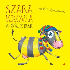 Szara krowa w żółte paski